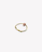 Ama ring in yellow gold and rhodochrosite